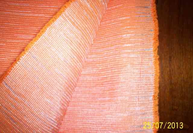 Отрез ткани оранжевого цвета